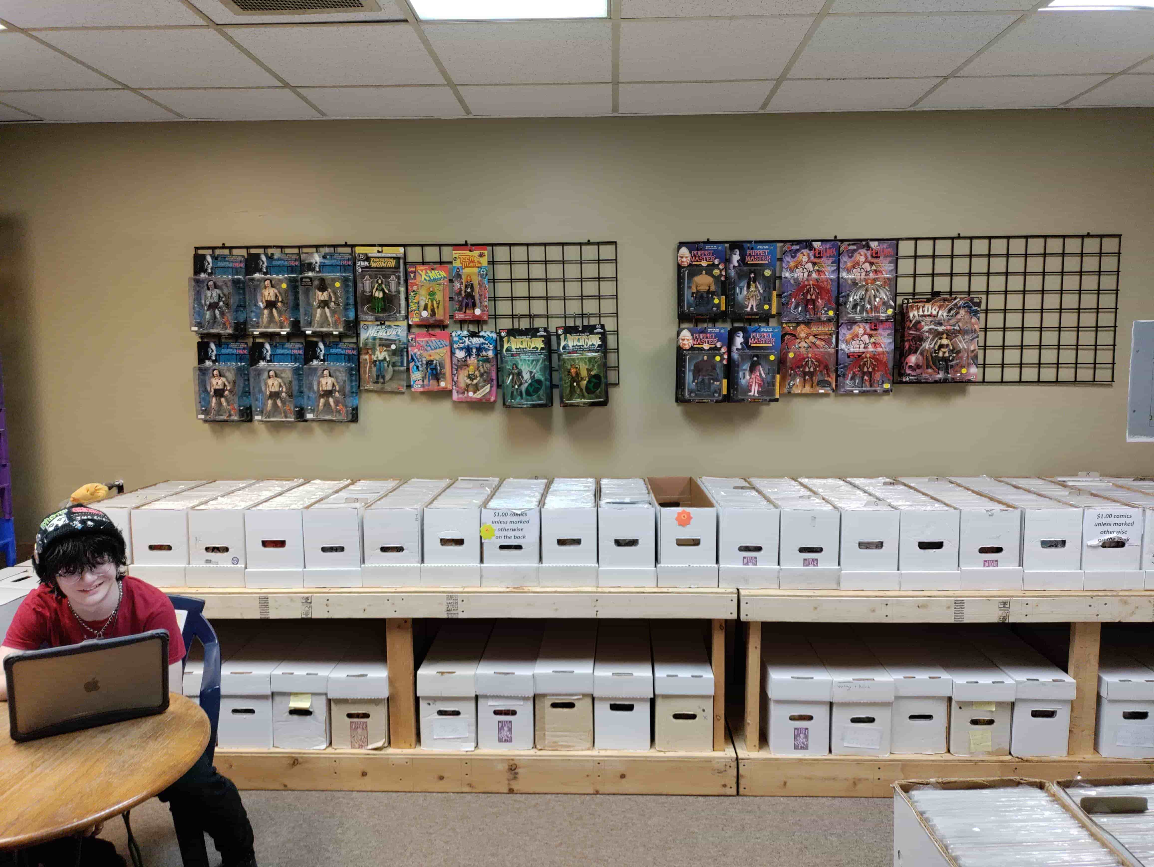 Front display area with Batman figures and DC collectibles